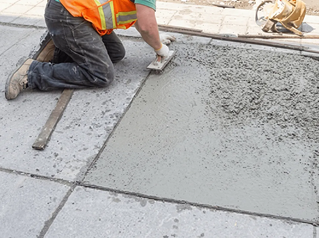 Professional repairing a concrete floor in Salt Lake City, UT