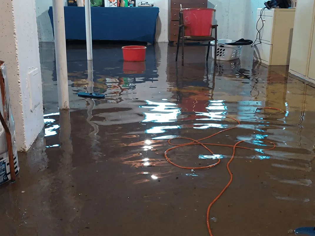 Basement with boiler, cabinets and washing machine completely flooded in Salt Lake City, UT